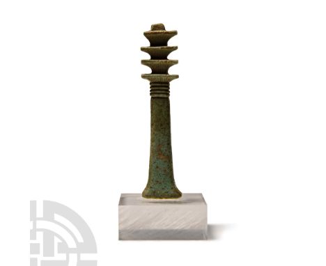 Late Period, 664-332 B.C. Olive-green glazed composition amulet with ribbed panel, flared base; mounted on a custom-made stan