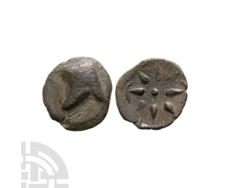 130-100 B.C. Pontus, uncertain mint. Obv: leather helmet. Rev: star of eight rays with small crescents. Baldwin 10-13 in RN 1