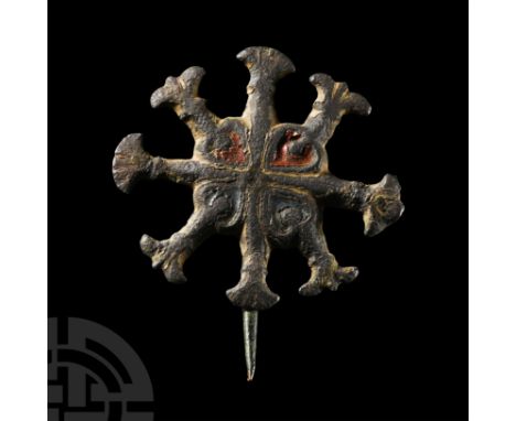 12th-13th century A.D. Livery badge formed as four heart-shaped cells with enamel fill, eight radiating arms each terminating