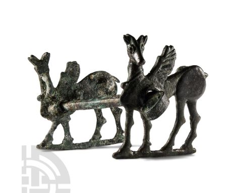 9th-8th century B.C. The cheekpieces formed as winged deer with horns and small ears, a circular opening to the body for the 
