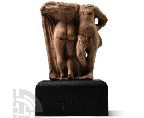 4th-3rd century B.C. Comprising two acephalic nude figures: the female shown from behind with rounded buttocks and a volumino