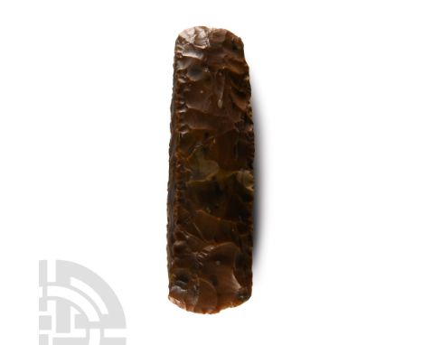 Neolithic Period, 5th-3rd millennium B.C. In amber-coloured flint, bifacially knapped with convex cutting edge, tapering prof