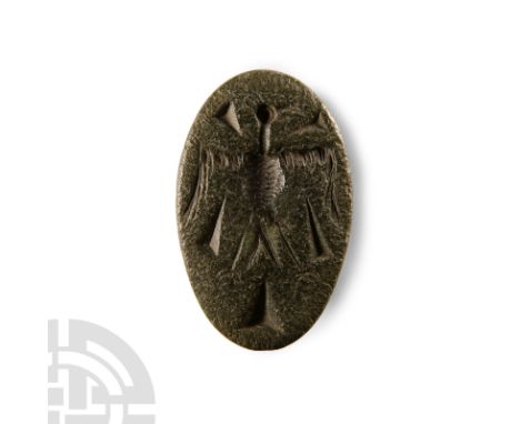 Circa 2500-2000 B.C. Carved stone seal formed as a bird with the head reversed, with drilled eyes and feather detailing to th