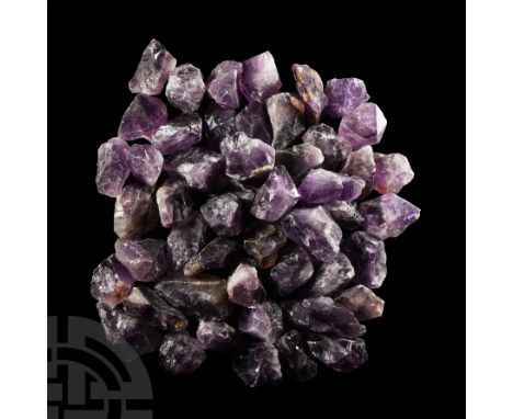 Of various sizes and shapes in dark to light purple colour.  3 kg total, 37-64 mm (1 3/8 - 2 1/2 in.).From Brazil. Ex Mineral