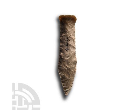 Neolithic Period, circa 1950-1600 B.C. Stout knapped dagger with tick lenticular-section body, integral T-shaped pommel; old 