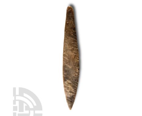 Neolithic Period, circa 2400-2050 B.C. Lanceolate with narrow rounded butt; tip professionally restored.  131 grams, 26.2 cm 