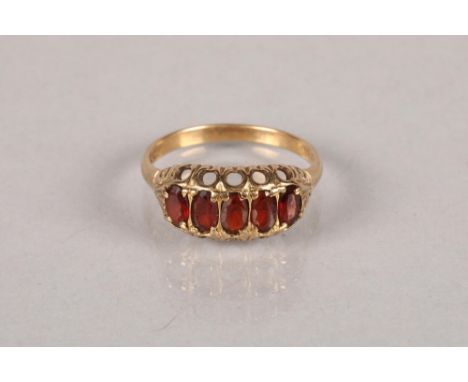 9 carat yellow gold and ruby dress ring; 2.8g 