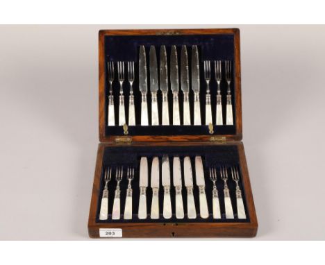 Silver plated and mother of pearl handled twelve piece fruit set; in an oak fitted box 