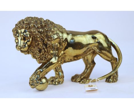 A solid bronze "MEDICI" lion, very heavy and well cast. Depicts a male lion with a sphere or ball under one paw. possibly 19t