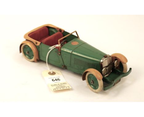 A scarce 1930's No.1 Meccano Constructor Car. An example made as an open 4 seater tourer. In green with red seats, yellow mud