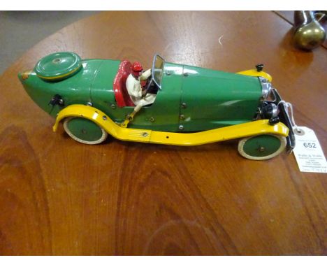 A rare 1930's No.2 Meccano Constructor Car. A boat tail example in green with yellow mudguards and running boards, red seat, 