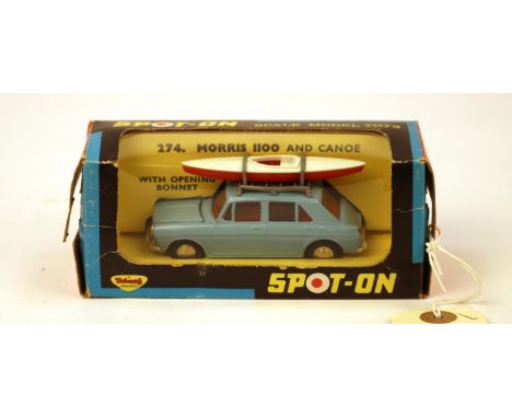 SPOT-ON by Tri-ang No.274. Morris 1100 with Canoe. In light blue with red interior, opening bonnet, grey roof rack with plast