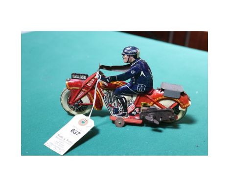A scarce Mettoy tinplate clockwork 'POLICE PATROL' motorcycle. Bike in red with yellow line and engine litho detailing, Dunlo