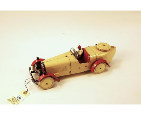 A rare 1930's No.2 Meccano Constructor Car. A boat tail example in cream with red mudguards, red seat, cream wheels with whit