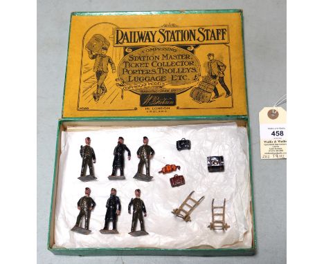 Britains No.155 Railway station staff, comprising station master, Ticket collector, porters, trolleys luggage, etc. Boxed in 