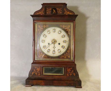 A 19th century continental mahogany cased marquetry inlaid bracket clock with gilt dial