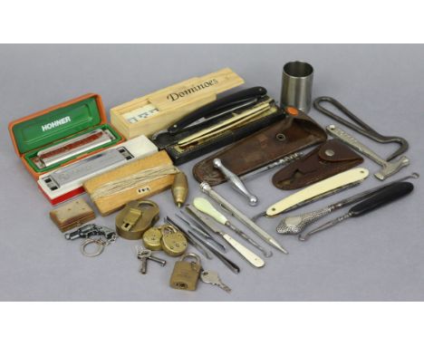 A stainless-steel button hook with silver handle; a Hohner “Super Vamper” harmonica; three cut-throat razors, etc.