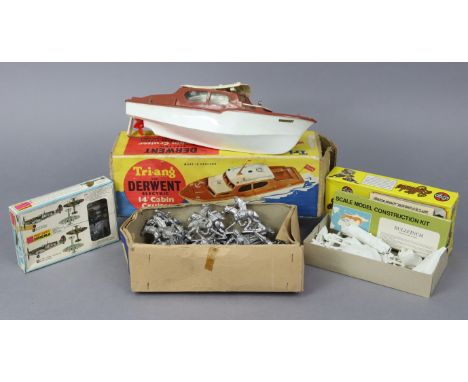 A Tri-ang “Derwent” electric 14” cabin cruiser; two model kits; a mini table football game, all boxed; a Reno Series bagatell