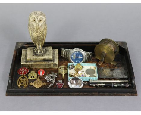 An early 20th century rosewood desk tray with silver-mounted corners, 12” wide (London 1919); a vintage small brass fly-fishi