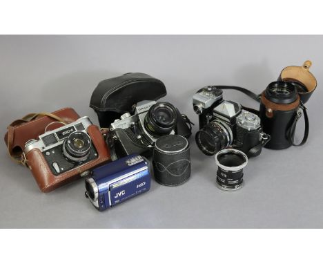 A Praktica “MTL3” 35mm camera; together with three other cameras; &amp; various camera accessories.