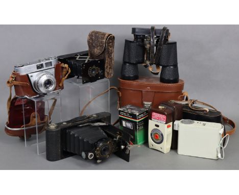 A Kodak “Vest Pocket” folding camera; an Eastman Kodak “No. 2-A Folding Autographic Brownie camera; a Kodak “Retinette 1A” ca