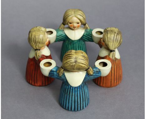 A 1960’s Goebel Hummel “Circle of Friends” candle ring holder. (HX 326).