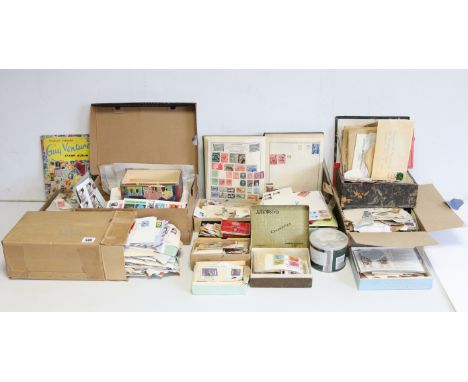 A collection of G B &amp; foreign stamps in two small albums &amp; loose; &amp; one hundred &amp; eighteen G B First Day Cove