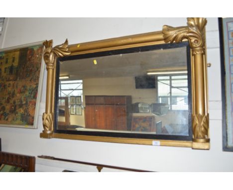 A gilt framed over mantel mirror 