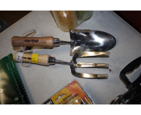 A garden trowel and fork (15)