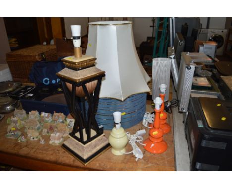 A quantity of various table lamp bases and shades