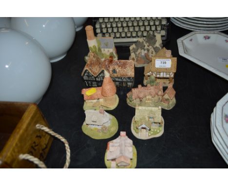 A collection of David Winter and other model houses 