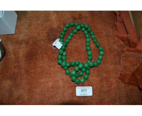 A jade coloured necklace (122)