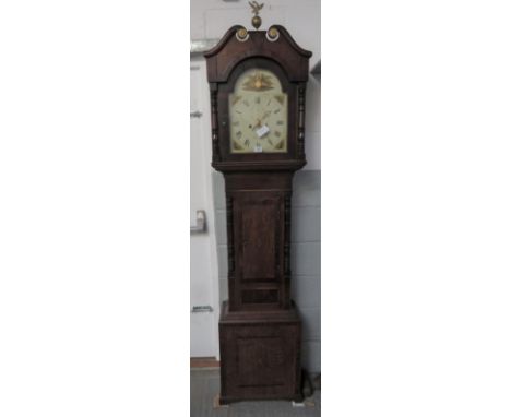 8 day longcase clock, with retailers name on dial John Roberts, Taunton, contained within an oak and crossbanded mahogany cas