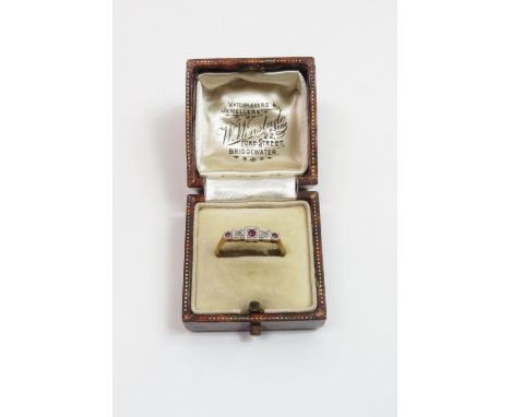 A ruby and diamond ring, stamped '18ct Plat', finger size N, 1.7 g gross, cased