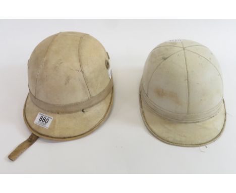 A vintage Everoak motorcycle helmet in cream with original lining and labels and another similar