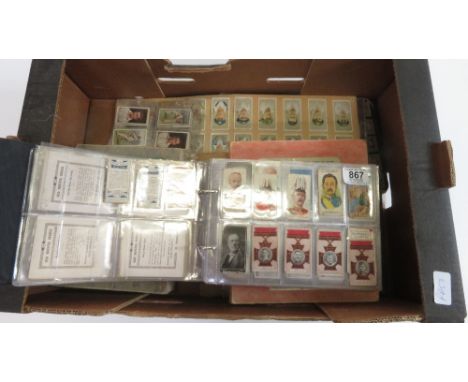 A modern album of assorted cigarette card odds and part sets, various subjects, some loose sheets glued with cigarette cards;