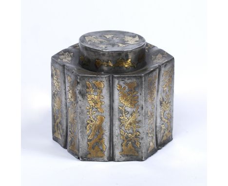 Hexagonal paktong tea caddy Chinese, mid 19th Century inset with gold coloured clouds, phoenix and other emblems 13cm across,