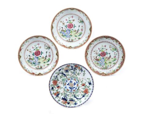 Three famille rose large saucer dishes Chinese, circa 1800 painted with a garden scene of birds, peonies and rock work  26cm 