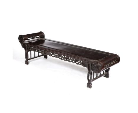 Hardwood Luohan day bed Chinese, circa 1900 with carved foliate scroll end and open supports 190cm x 55cm, 59cm high
