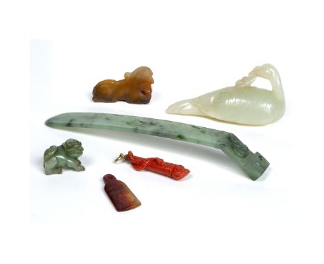 Jade brush rest Chinese, 19th Century black spotted green of sceptre form with one end carved with a bat and seat Pu-tai 13.5
