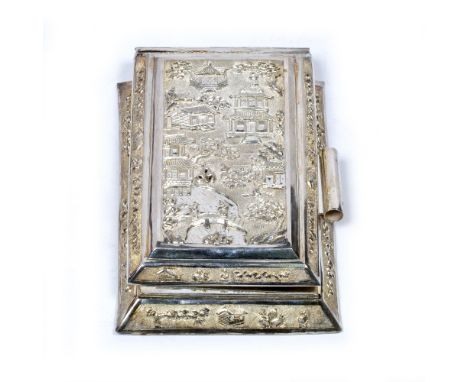 Silver writing box Chinese, 20th Century decorated to the front depicting houses and figures, with a folding design in a cust