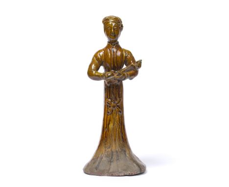 Treacle glazed tomb figure Chinese, Tang style the female figure holding a lute 21cm high