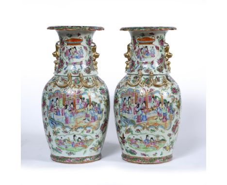 Pair of Canton polychrome vases Chinese,19th Century each painted with a panel of courtiers,within a surround of auspicious a