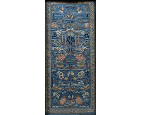 Embroidered panel  Chinese, 19th/20th Century stitched depicting potted plants and flowers against a turquoise blue backing w