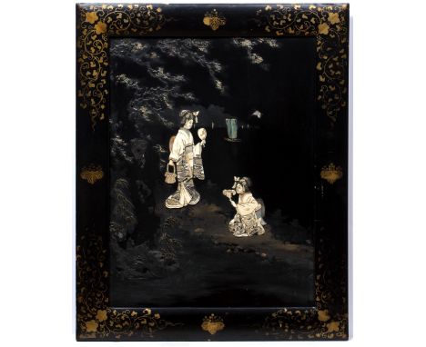 Black lacquer panel  Japanese, late 19th Century mounted in bone with two geisha in a lacquer and gilt frame 62cm x 50cm over