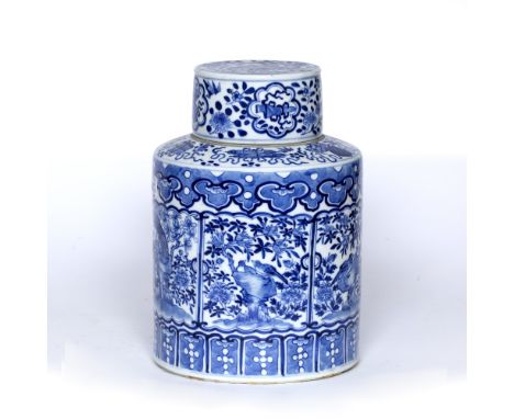 Blue and white cylindrical vase and cover Chinese, 19th Century decorated with panels of birds and floral motifs, the neck de