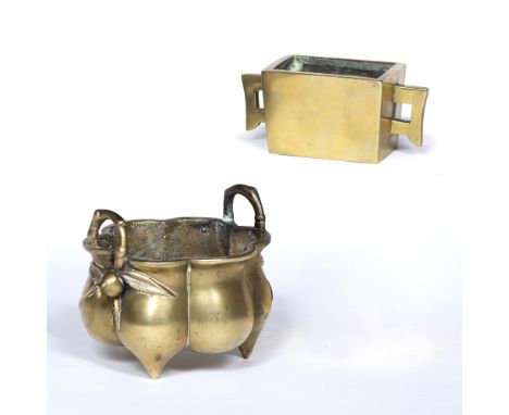 Two brass censers Chinese, 19th Century the first of flower form, with stylized fruit to each end 10.5cm high x 11.5cm across