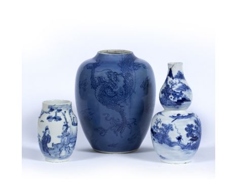 Blue and white small vase Chinese, 19th Century depicting figures looking out from a window upon a garden, Kangxi mark 12cm  