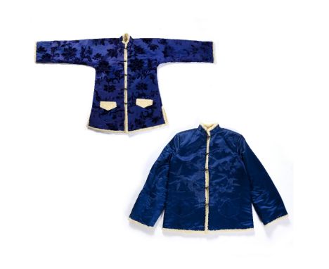 Two astrakhan wool coats Chinese both with a blue lining, one with foliate patterns to the outside first 84cm high x 164cm ac