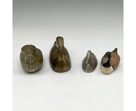 Lot includes brass duck 5"L, carved soapstone - signed (chips on head &amp; tail) 4"L, silver toned metal duck 3"L and cerami
